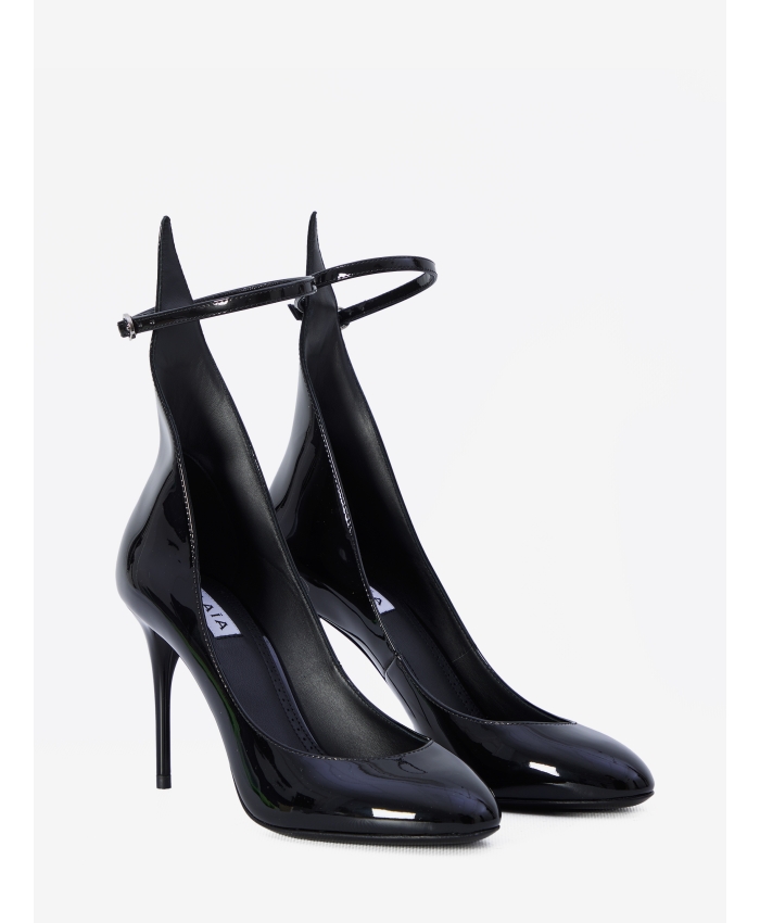 ALAIA - Decollete pumps in patent leather