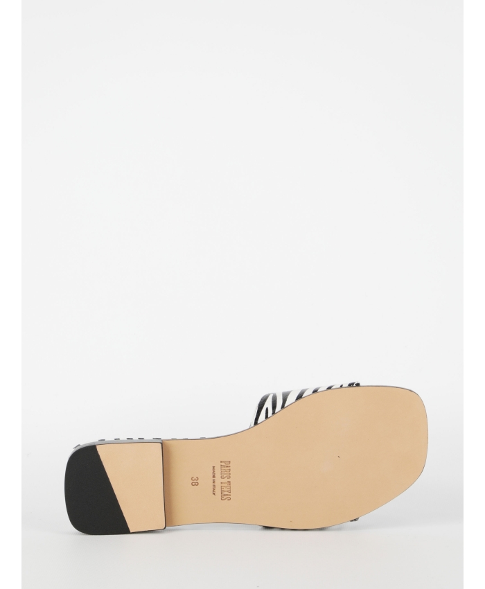 PARIS TEXAS - Zebra-print flat sandals